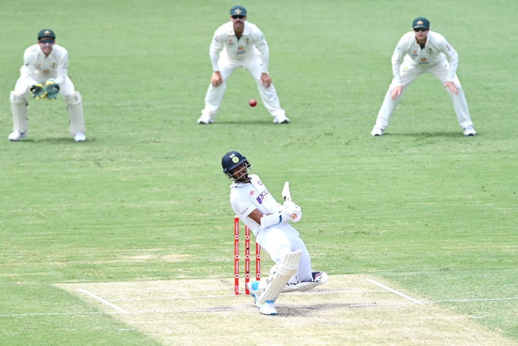 Sundar ducking a well directed bouncer at the Gabba on day three