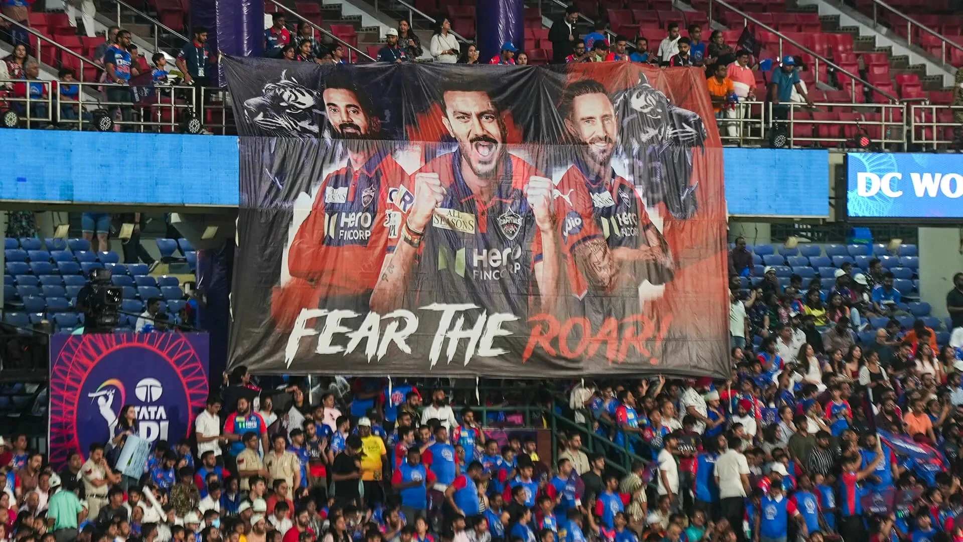 Watch DC Fans Troll RCB Crowd as Team Goes Past 49 Runs.