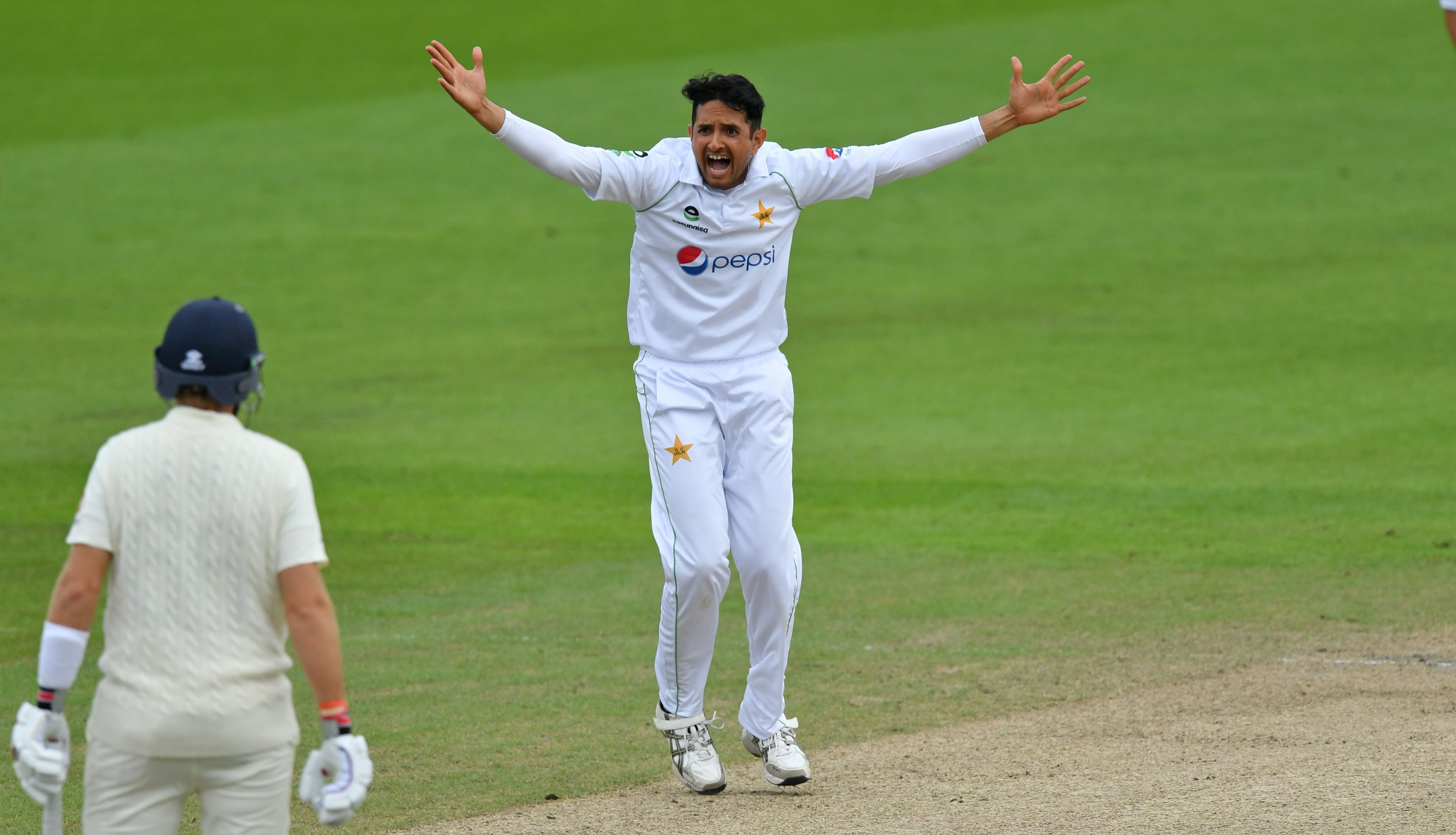 Pakistan pacer Mohammad Abbas celebrates after dismissing the batsman.
