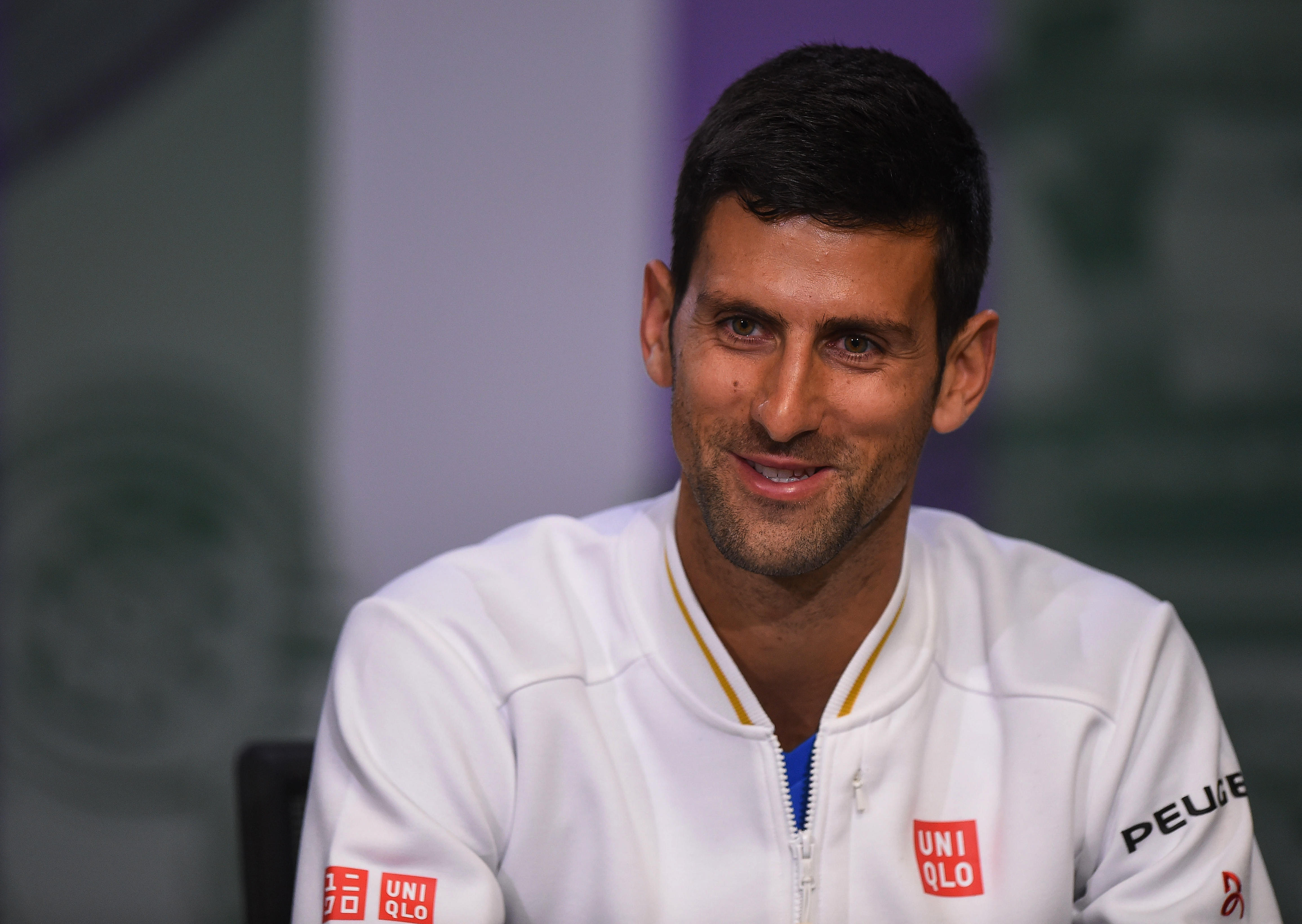 Novak Djokovic of Serbia speaks to the media during a press conference prior to the Wimbledon Lawn Tennis Championships at the All England Lawn Tennis and Croquet Club on June 26, 2016 in London, England.