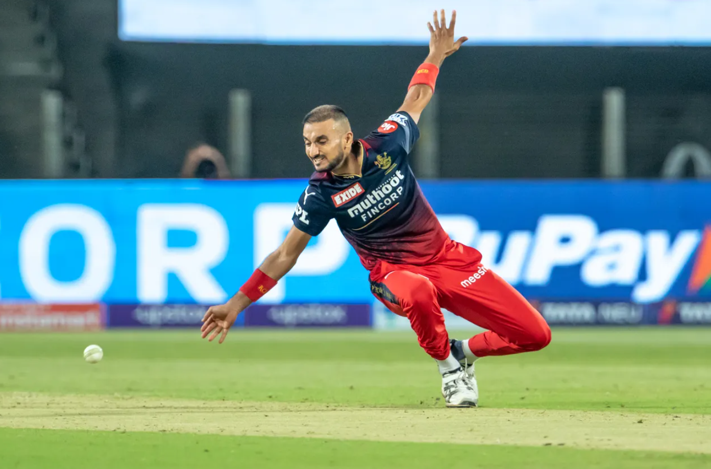 Harshal Patel in action during RCB's fixture against MI