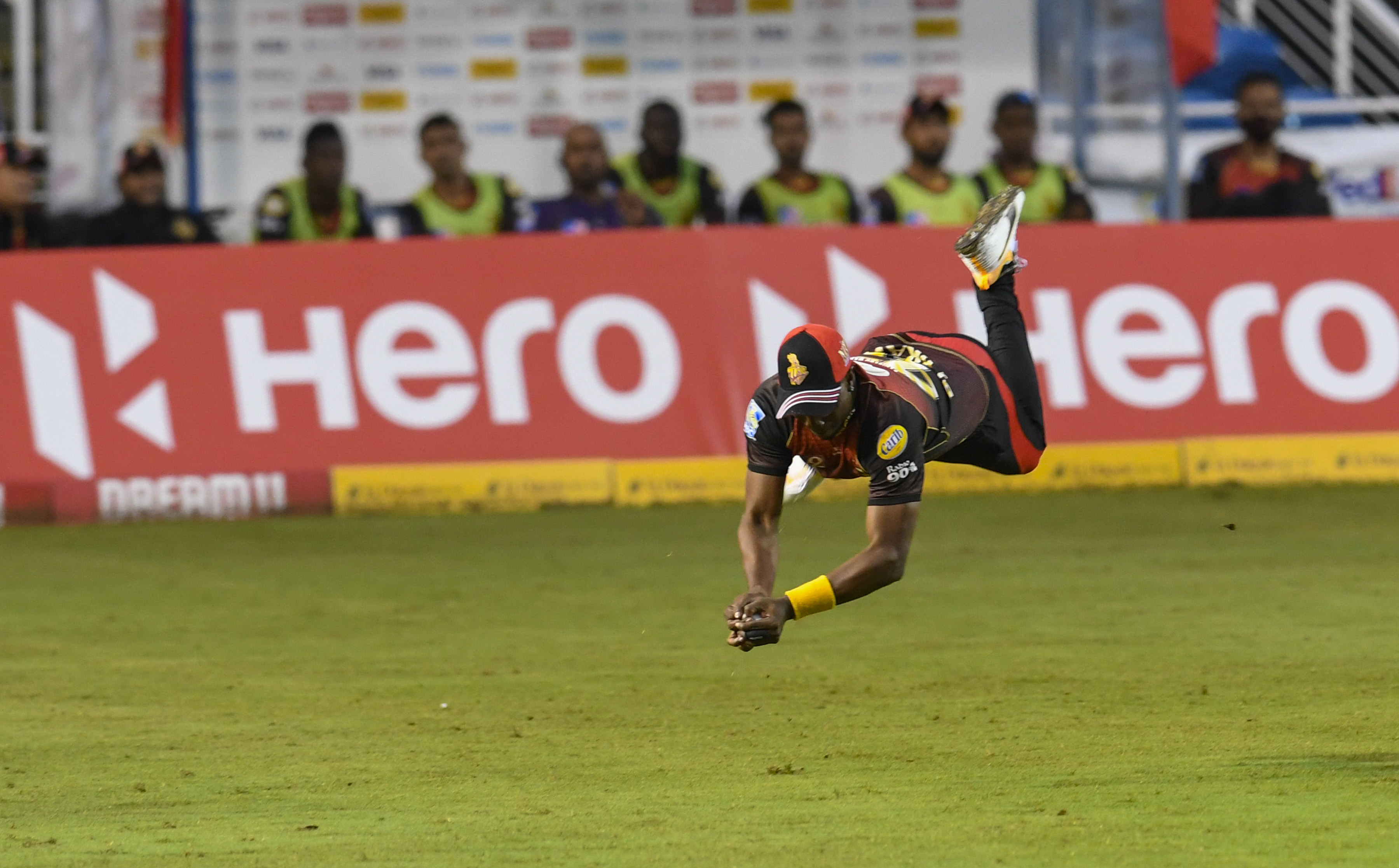 VIDEO | Airborne Dwayne Bravo pulls off electrifying low grab to leave bowler ecstatic