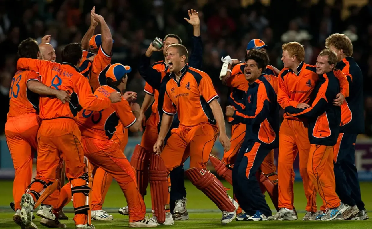 Netherlands celebrates after defeating England by 4 wickets.