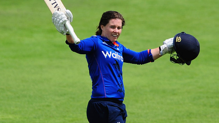 Tammy Beaumont celebrates after scoring a century for England Women.